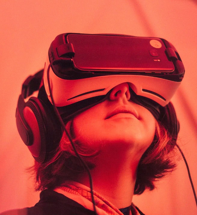 Person using virtual reality headset for immersive experience.