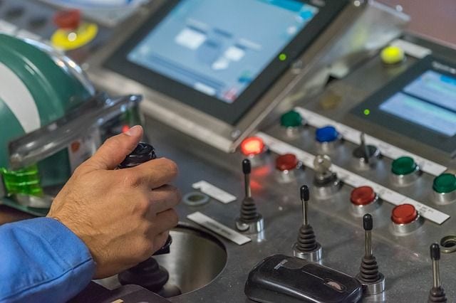 Control panel for home automation systems with touch screen and manual switches.