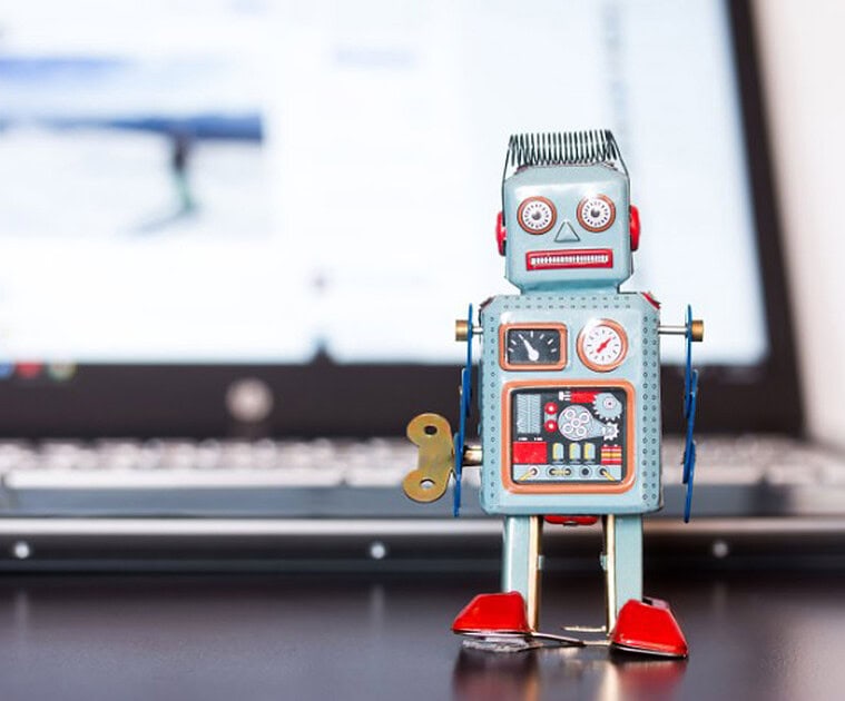 Cute robot toy symbolizing responsible AI development and ethics.