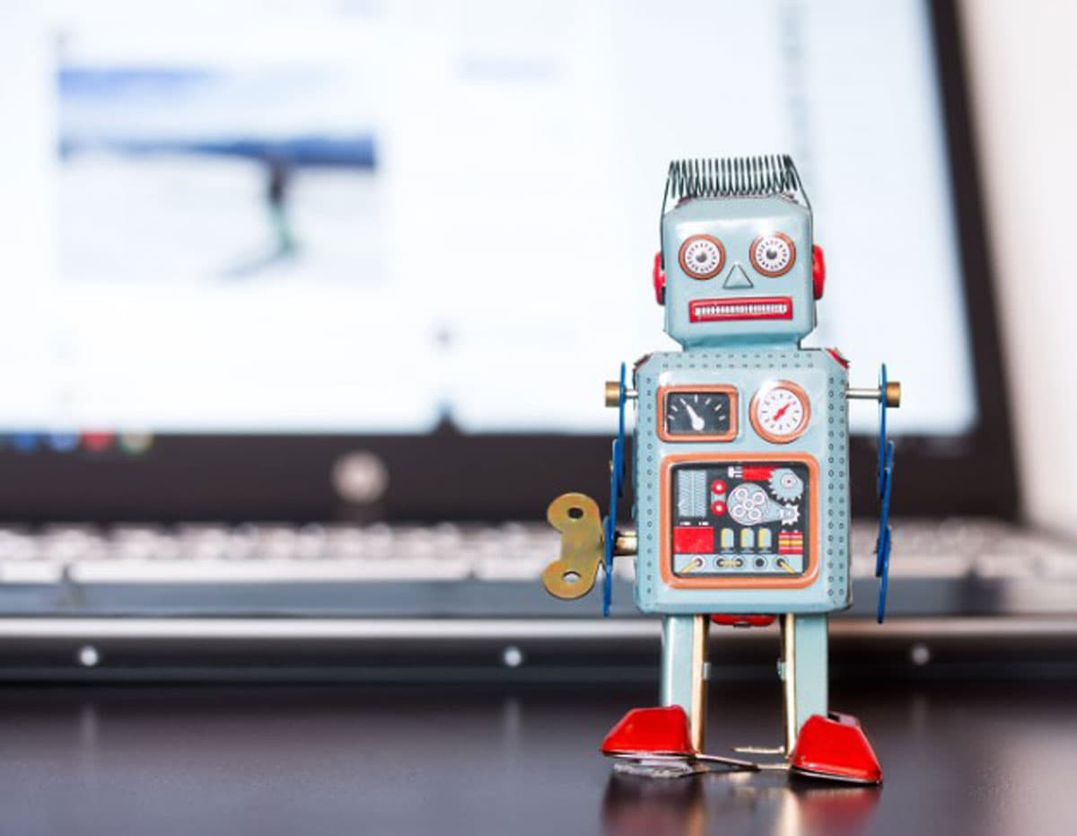 Cute robot toy symbolizing responsible AI development and ethics.