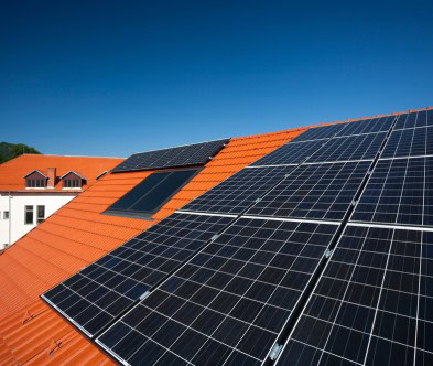 Solar panels installed on rooftops in Cape Verde for renewable energy.