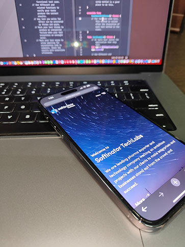 IOS app screen displaying welcome message from Softinator TechLabs.