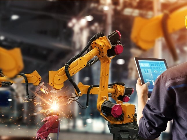 Powered robotic arms in manufacturing processes.