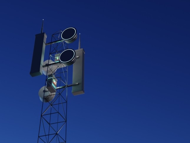 Cellular communication tower with antennas for wireless signals.