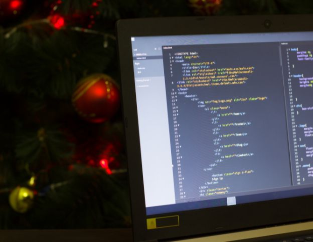 Software code on a laptop screen for website performance analysis.