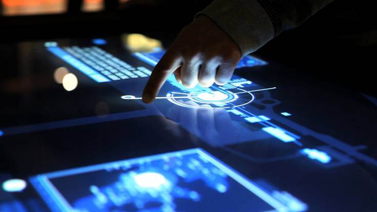 Hand interacting with digital middleware interface on a touchscreen device.