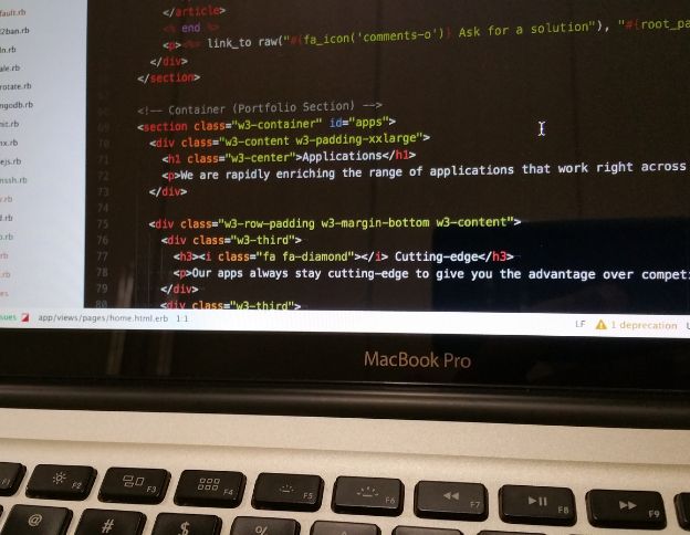 Ruby code on a laptop screen showcasing development for AI and ML projects.