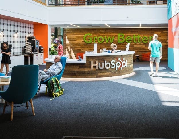 HubSpot office reception area with seating and branding.