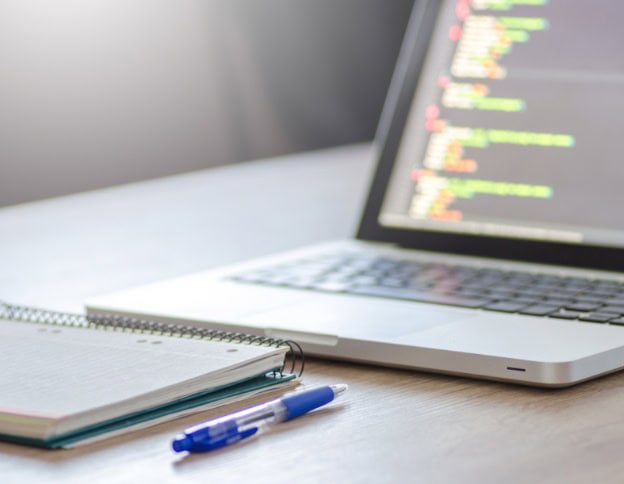 AI and machine learning coding on a laptop screen.