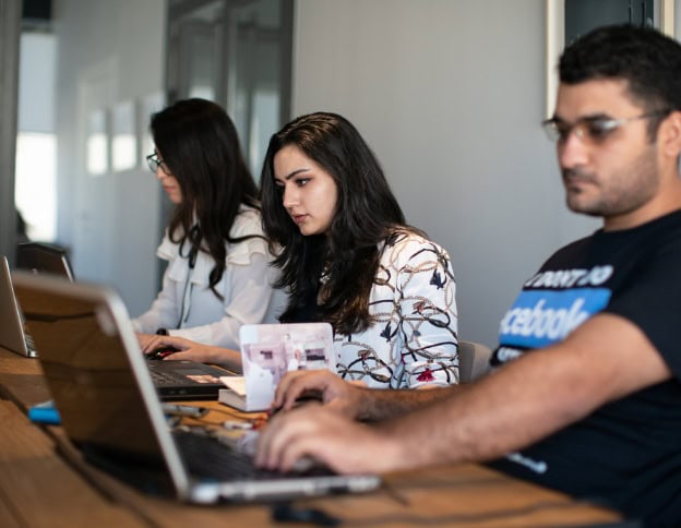 AI and ML developers working on innovative projects at Softinator TechLabs.