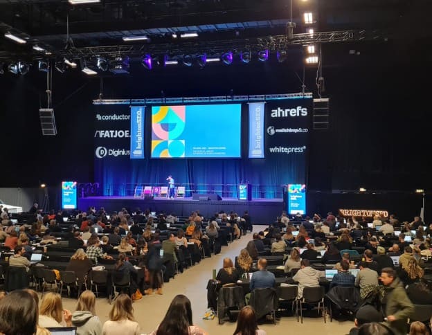 AI and ML conference presentation on stage at Softinator TechLabs.