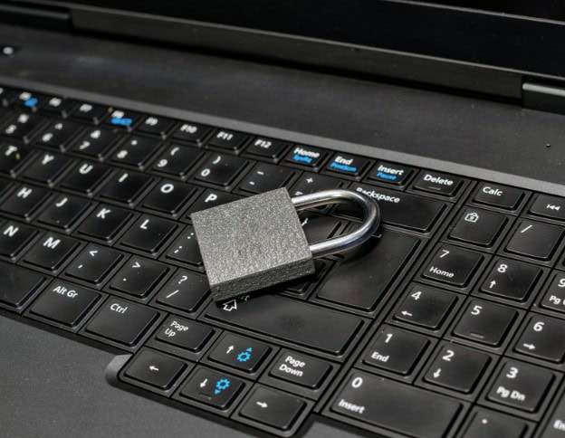 Security lock on a laptop keyboard symbolizing data privacy.
