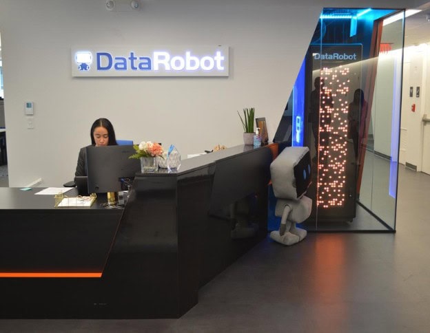 DataRobot AI and ML development lab with robotic data processing system.
