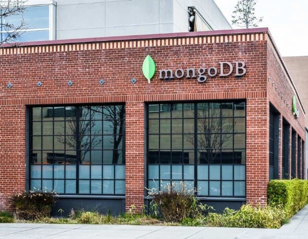 Modern MongoDB data storage building with glass windows and brick exterior.