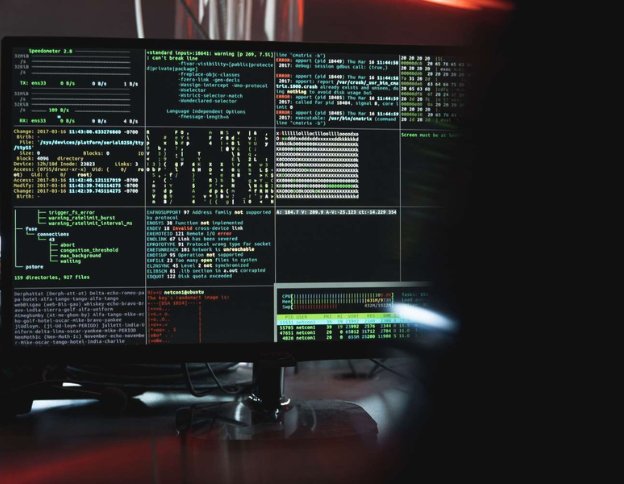 Monitoring DevSecOps tools and security metrics on a computer screen.