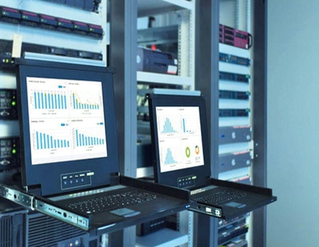 Data center servers and monitoring screens in a professional IT environment.