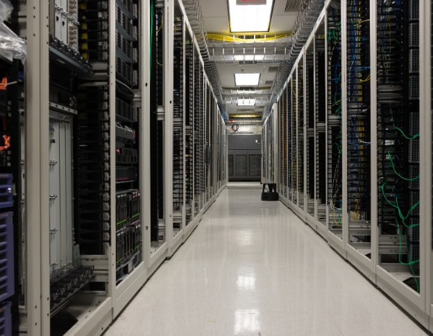 Modern data center with server racks for data warehousing solutions.