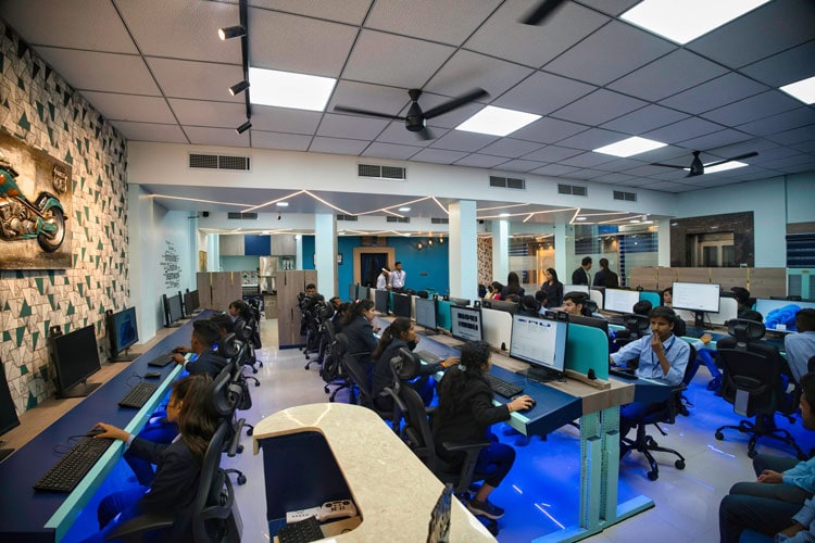 AI and ML developers working in a modern tech lab environment.