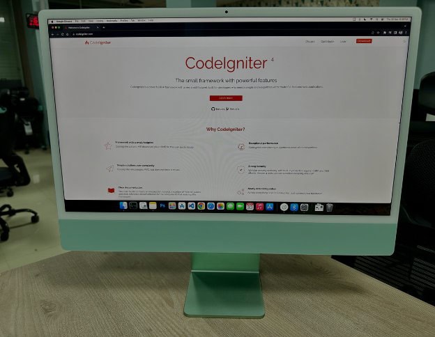 Computer screen displaying CodeIgniter framework homepage for web development.