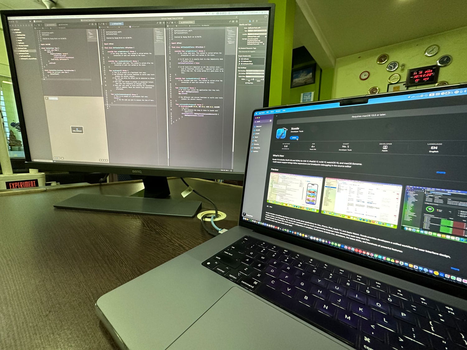 Developer working on Android app code on dual screens at Softinator TechLabs.