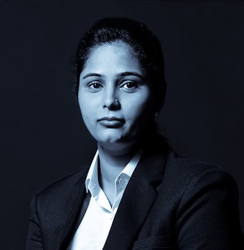 Professional woman in business attire representing AI and ML development.
