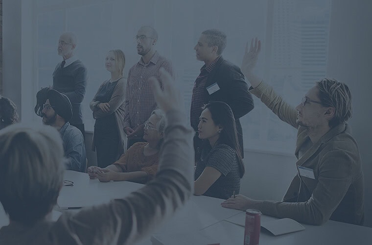 Team of AI and ML experts collaborating in a modern office setting.