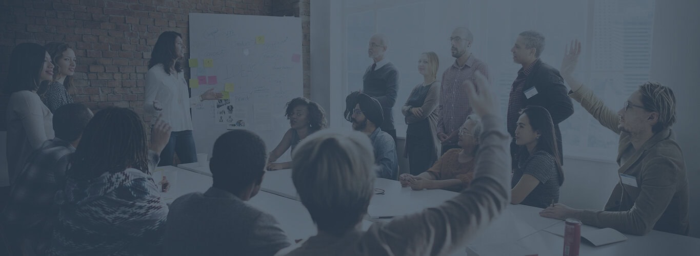 Team of AI and ML experts collaborating in a modern office setting.