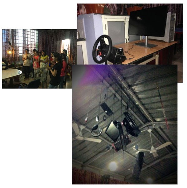 Softinator TechLabs Office and Workspace Modern office workspace with computers, gaming setup, and ceiling equipment.